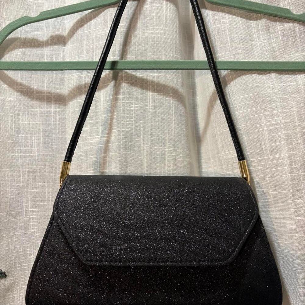 Black glittery purse with gold accents